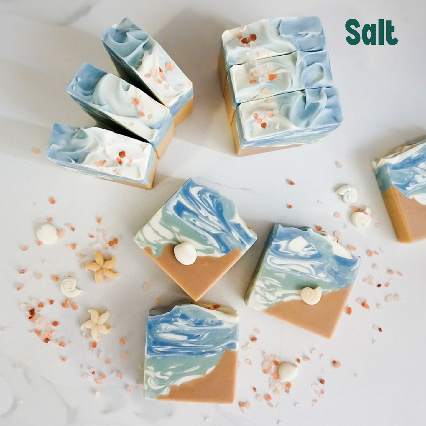 Marbled soap bars with visible salt on a light background