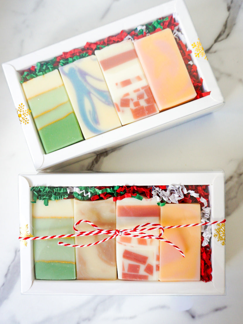 2 boxes of 4 colorful soaps in a white gift box
