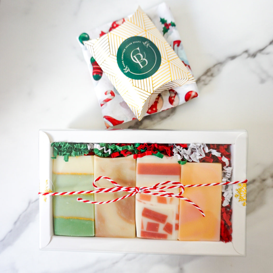 4 colorful soaps in a white gift box