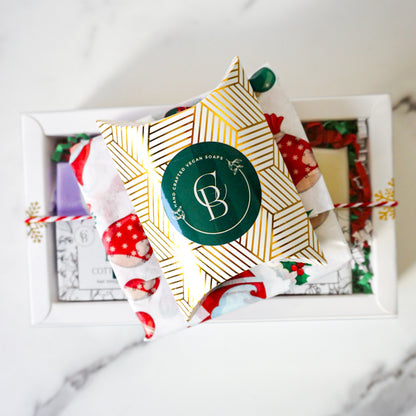 Decorative box with a brand logo on a white surface