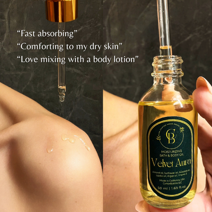 Bottle of Velvet Aurea moisturizing bath & body oil with dropper, applied to skin.