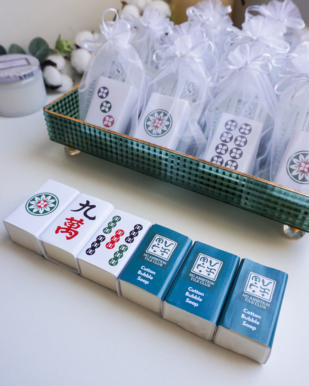 Packaged items with visible branding on a white surface
