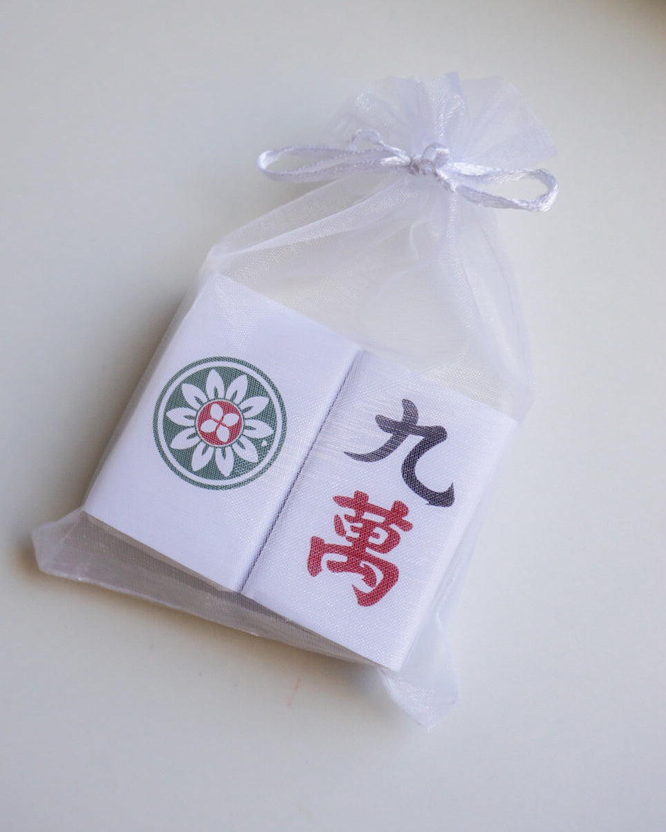 Product packaging with a brand logo and text on a light background